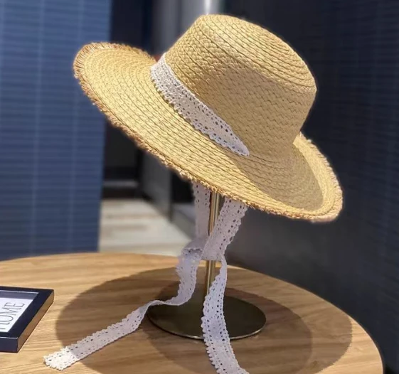 Cappello da sole estivo in paglia intrecciata