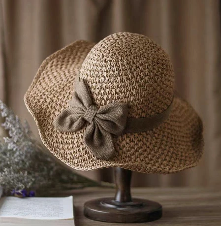 Cappelli di paglia color marrone per le donne
