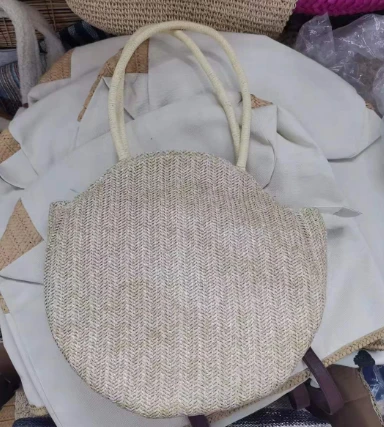 Borsa da donna per le vacanze in paglia rotonda intrecciata in PP