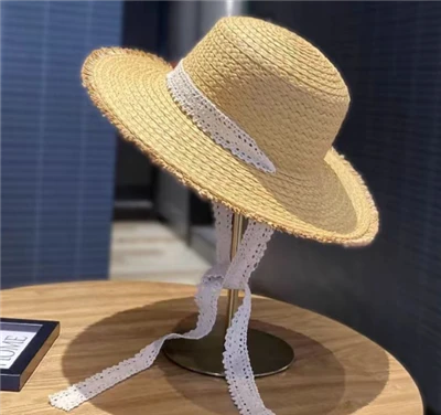 Cappello da sole estivo in paglia intrecciata