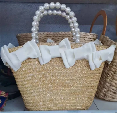 Peral gestisce il sacchetto di paglia da donna di grano naturale