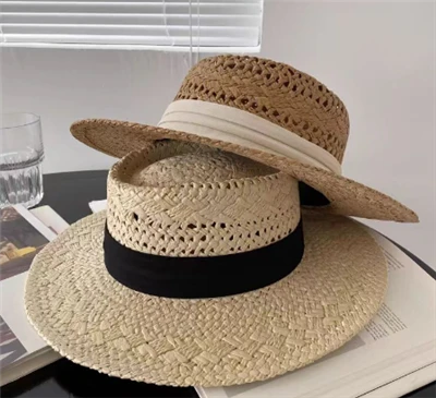 Cappello da spiaggia da donna in paglia con nastro nero