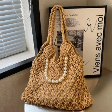 Borsa da donna fatta a mano in corda di cotone marrone cava